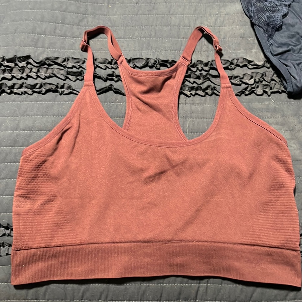 Never worn. Definitely more of a purple color than It looks in the photos